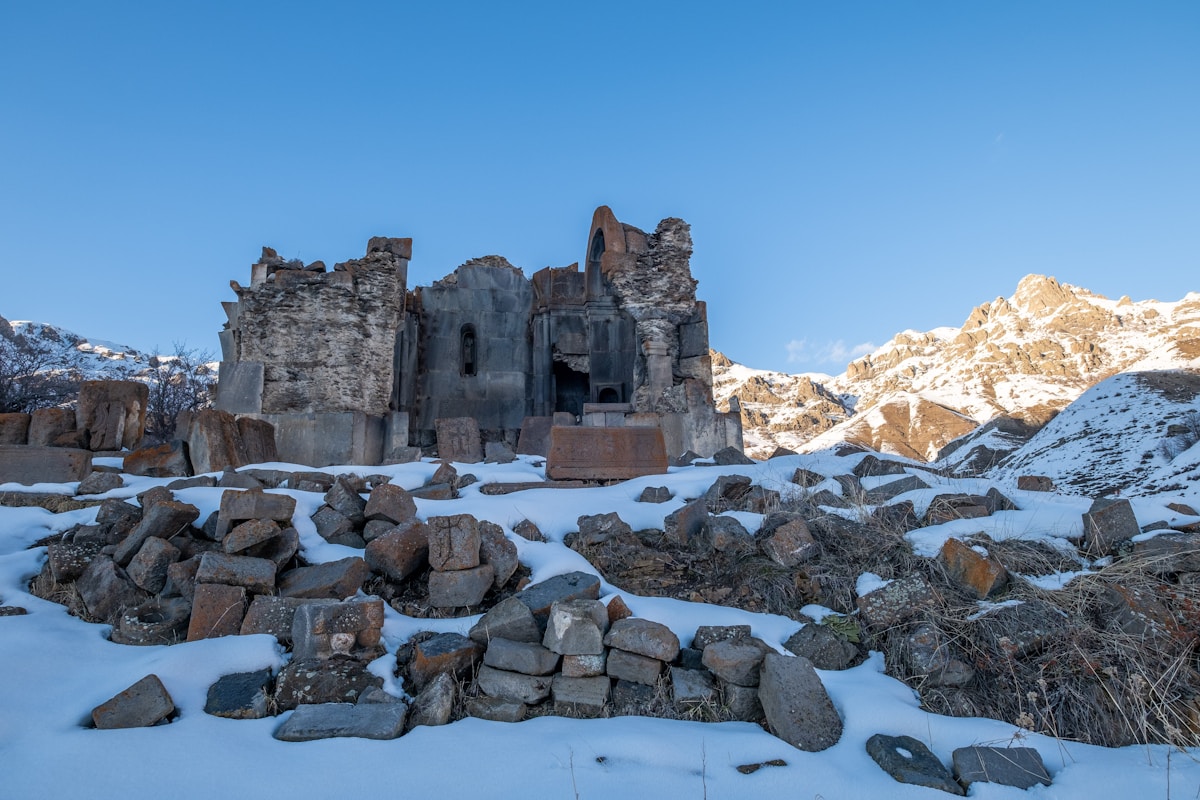 Armenian monastery ruins covered in snow — visiting Armenia in December