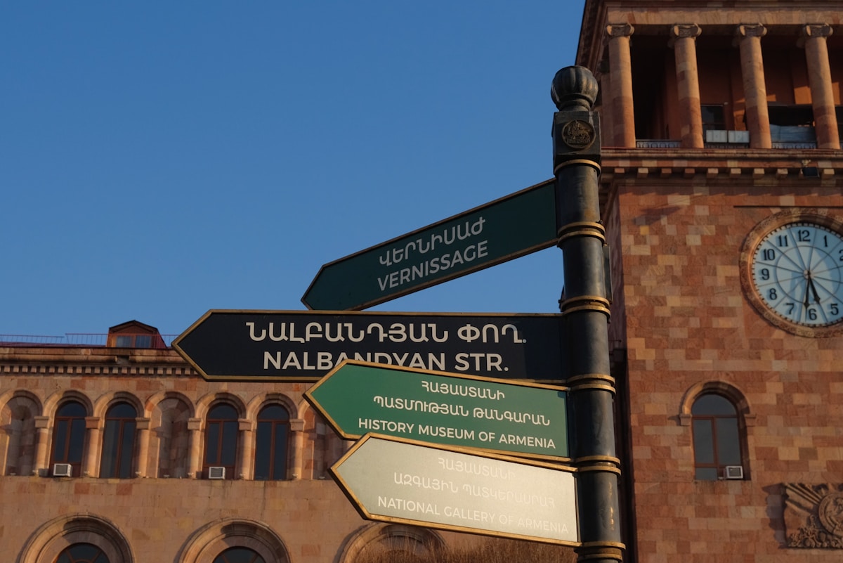 Street signs pointing towards the Vernissage market and History Museum of Armenia, central Yerevan