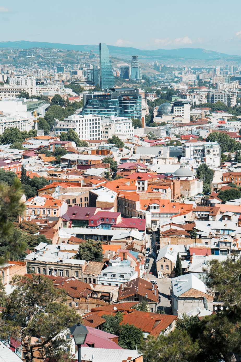 Aerial view of Tbilisi cityscape showing the historic Old Town and Narikala Fortress, Georgia